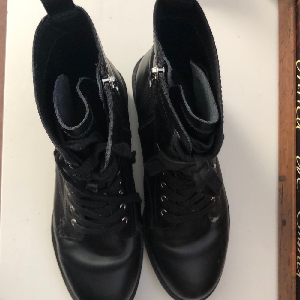 Steven Madden combat boots.